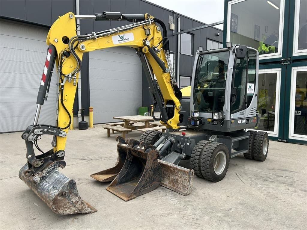 2023 Wacker Neuson EW65 wheel excavator, front three-quarter view