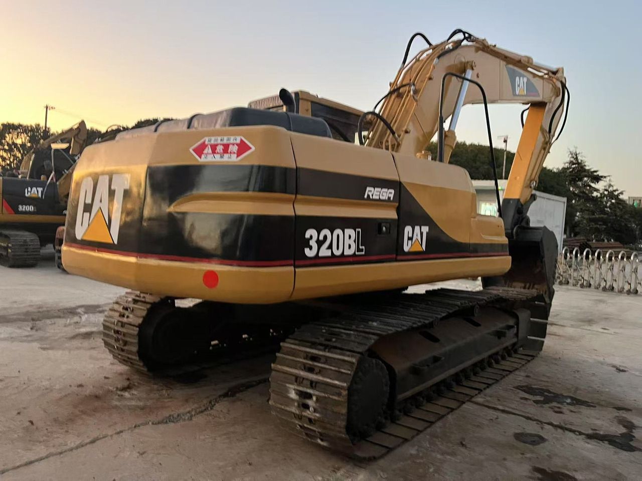 2014 Caterpillar 320BL crawler excavator, rear three-quarter view