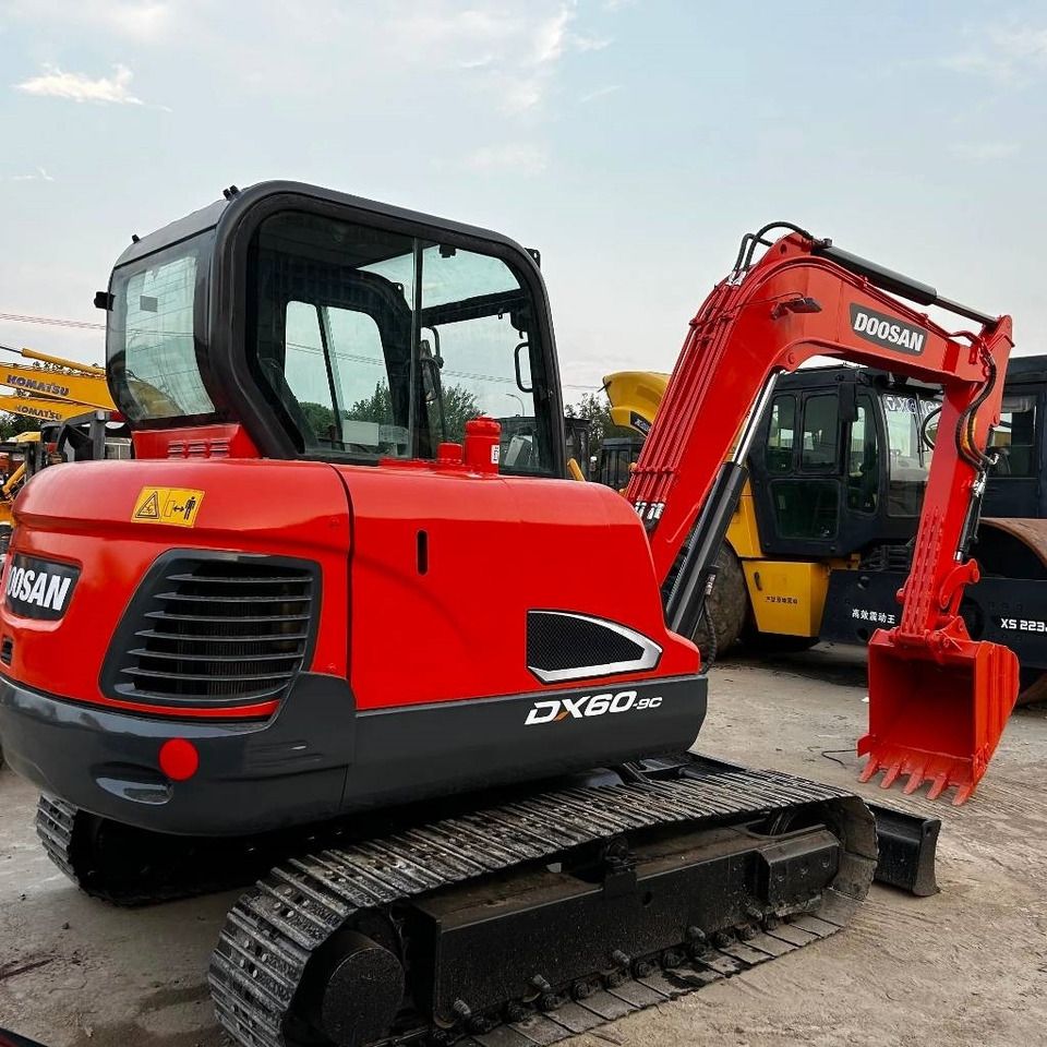 2023 Doosan DX60-9C mini excavator, rear three-quarter view