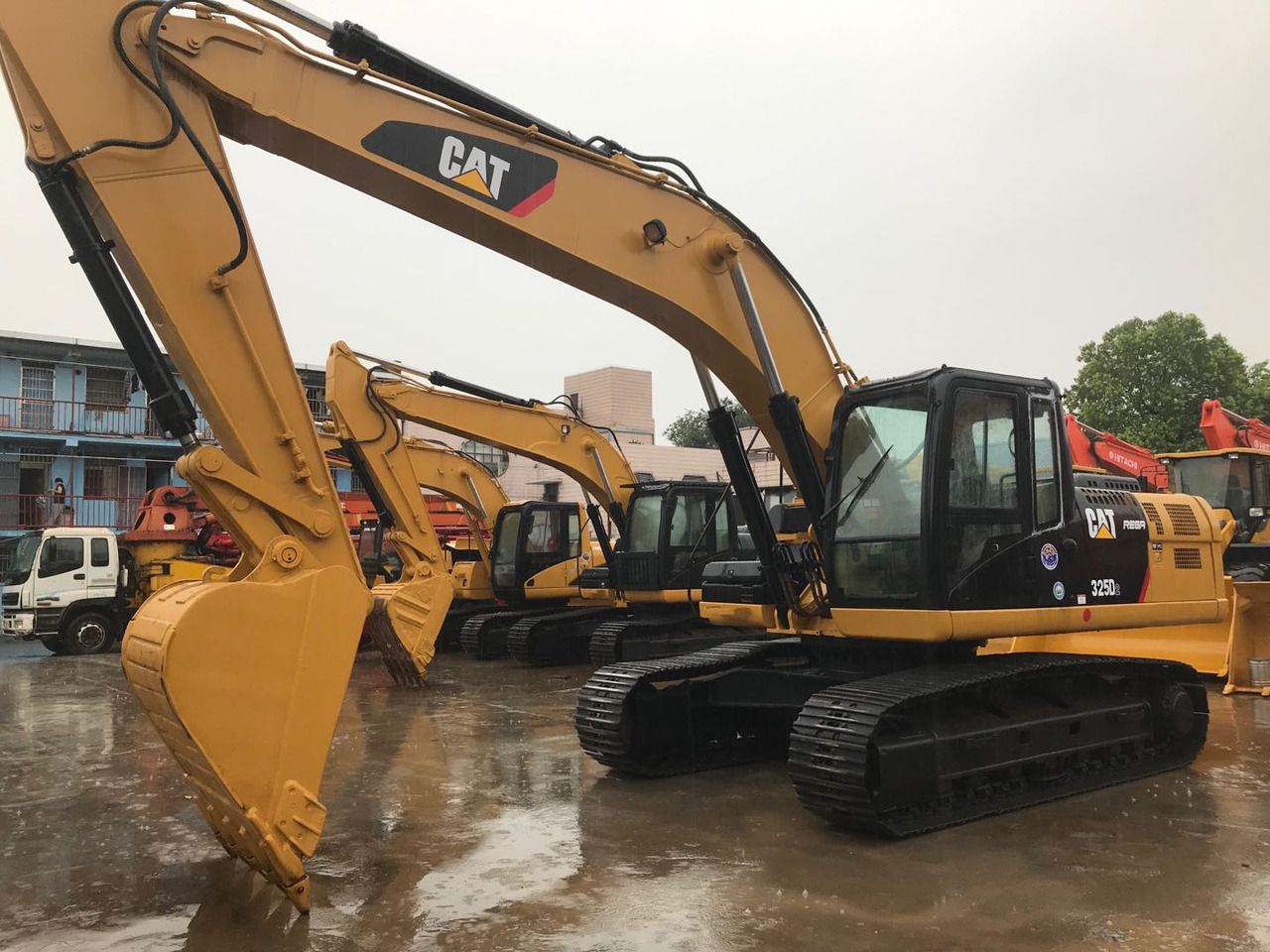 2021 Caterpillar 325D crawler excavator, front three-quarter view