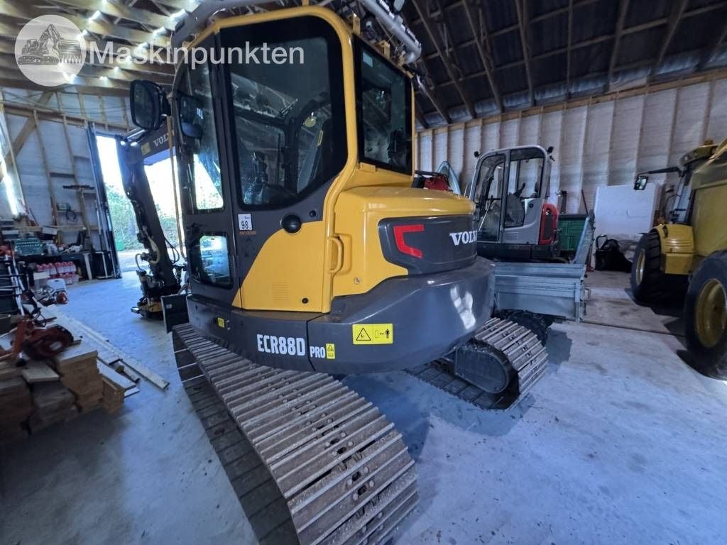 2022 Volvo ECR88D mini excavator, rear three-quarter view