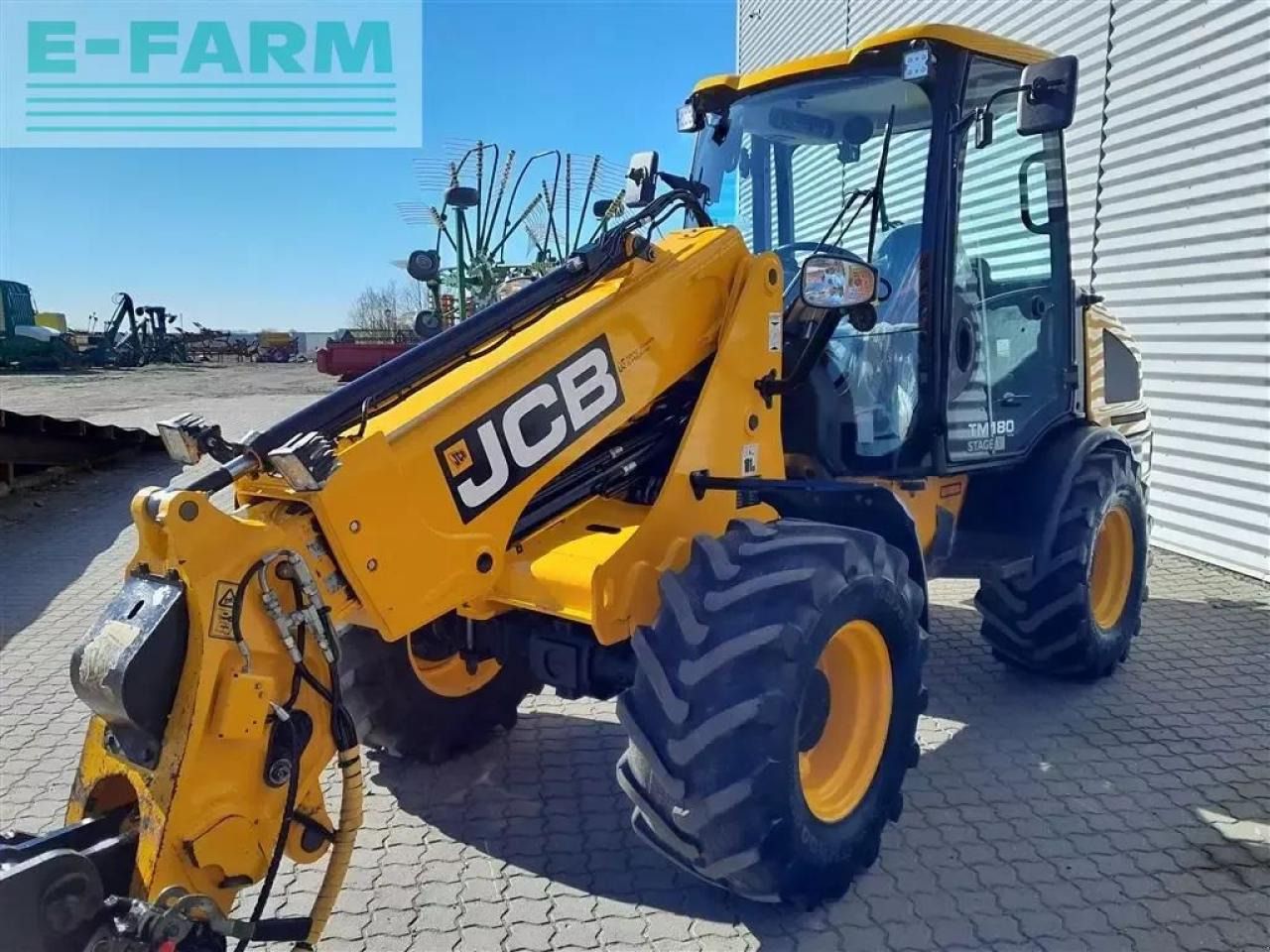 2021 JCB TM180 telescopic wheel loader, front three-quarter view