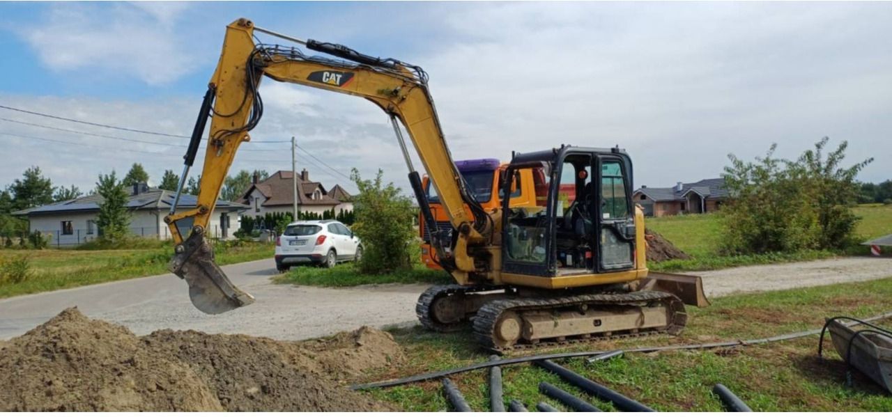 2013 Caterpillar 308E2CR crawler excavator side view