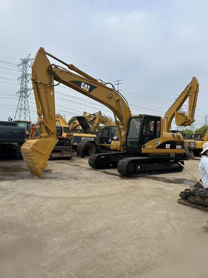2024 Caterpillar 320CL crawler excavator, side view
