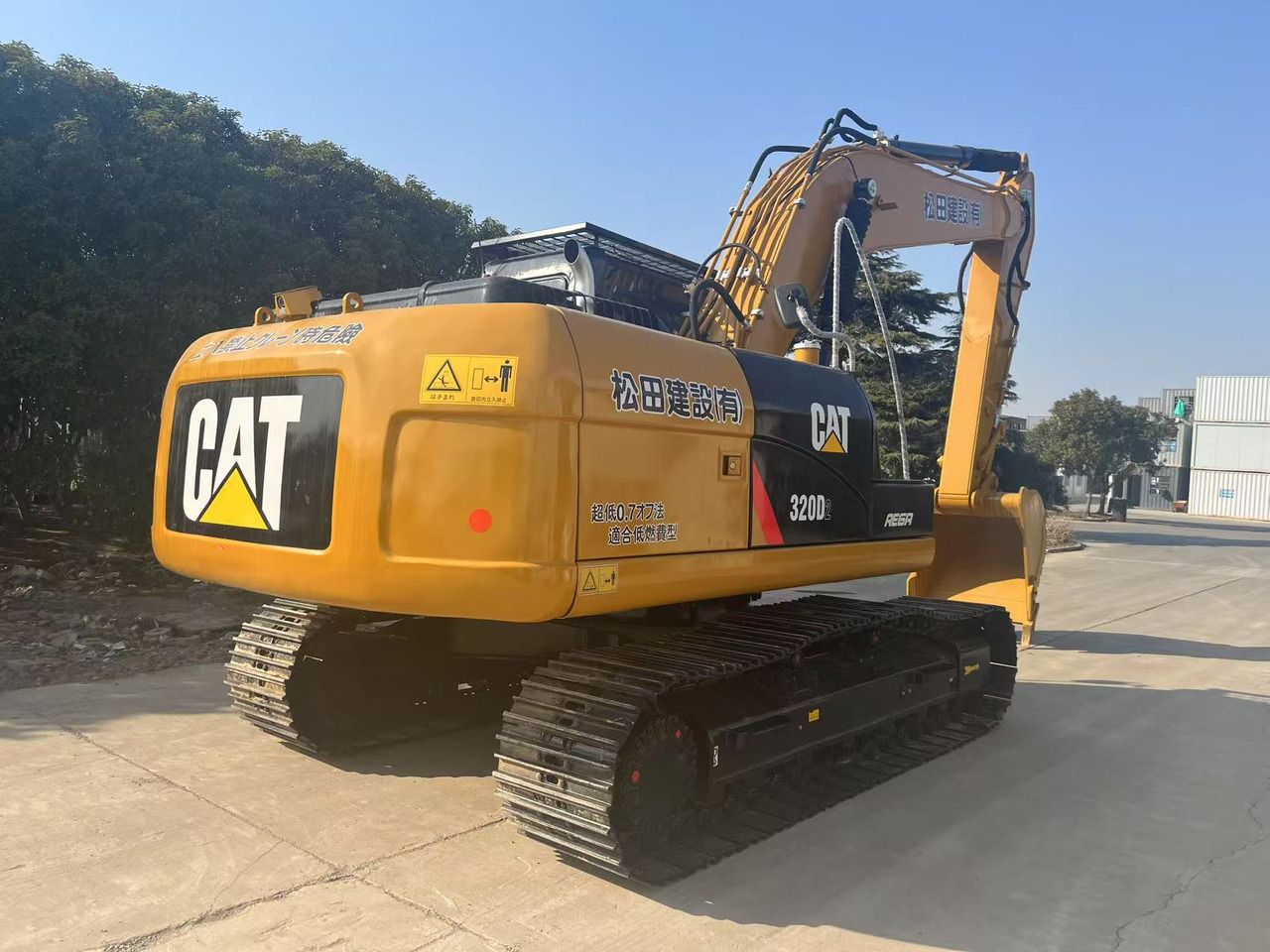 2023 Caterpillar 320D2 crawler excavator rear three-quarter view