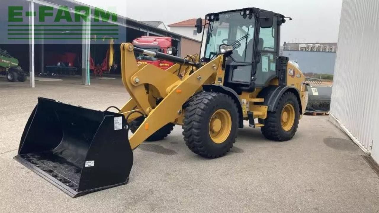2023 Caterpillar 908 wheel loader, front three-quarter view 2023 Caterpillar 908 wheel loader, front three-quarter view