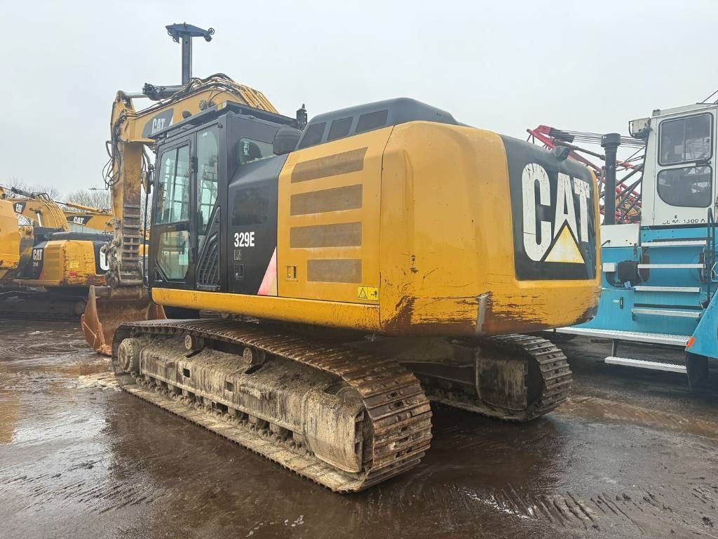 2012 Caterpillar 329E crawler excavator, rear three-quarter view