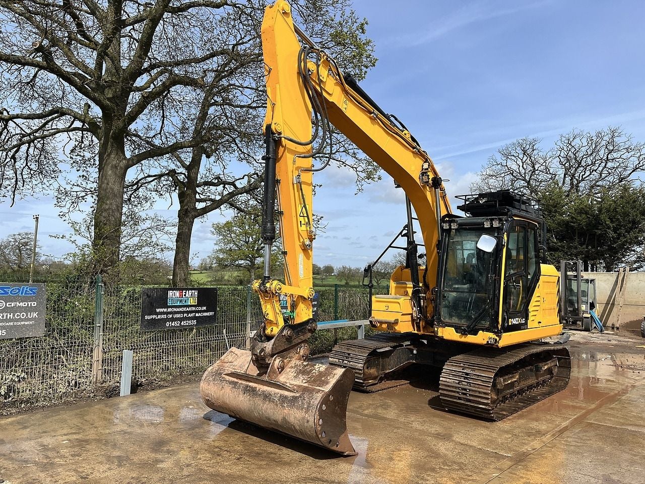 2023 JCB 140X LC crawler excavator, front three-quarter view