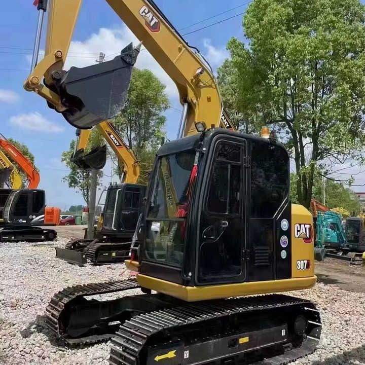 2024 Caterpillar 307E mini excavator, front three-quarter view