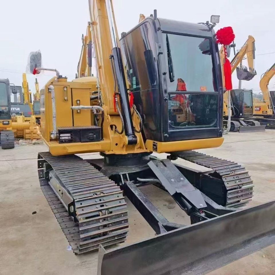 2024 Caterpillar 307E2 mini excavator, front three-quarter view