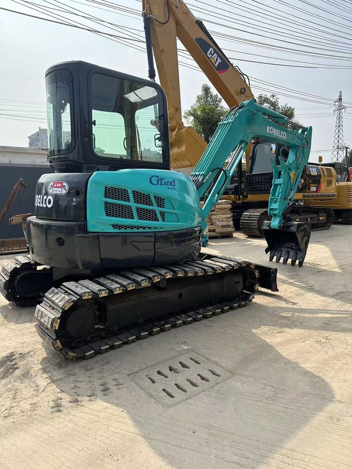 2013 Kobelco SK55SR mini excavator, rear three-quarter view 2013 Kobelco SK55SR mini excavator, rear three-quarter view