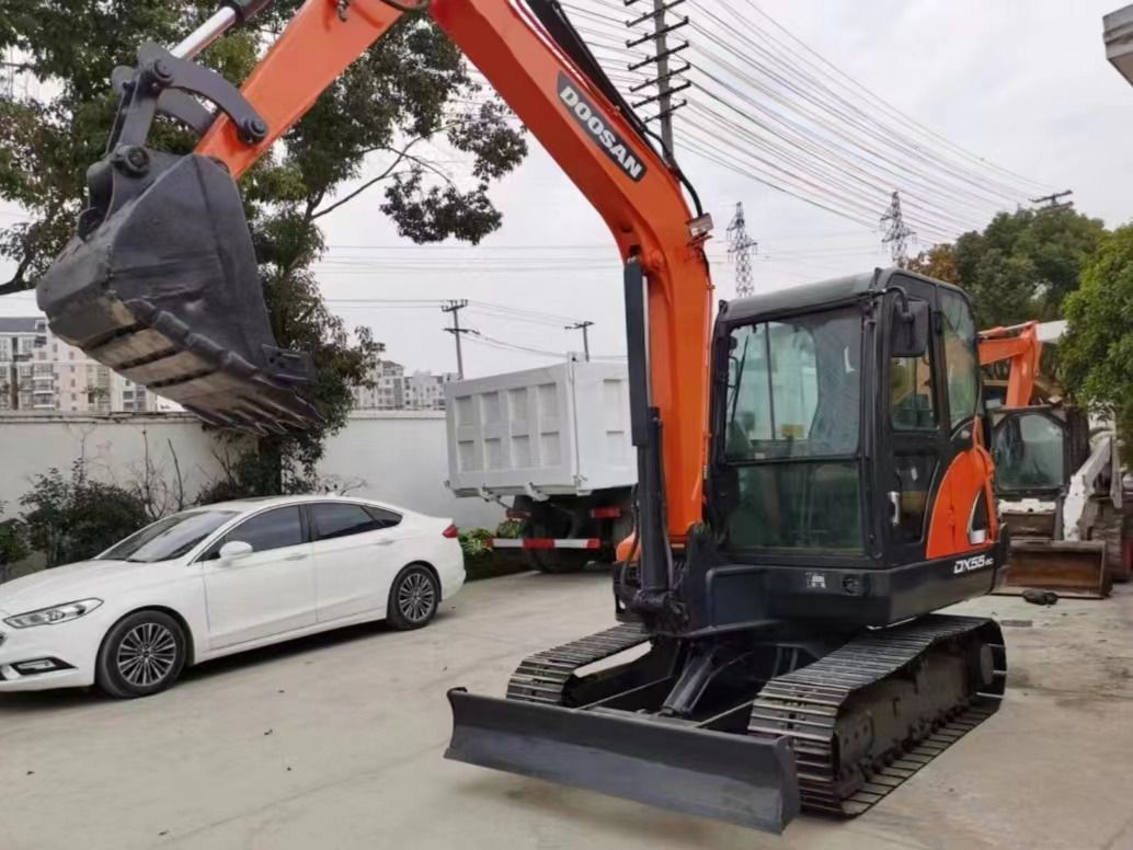 2022 Doosan DX55 mini excavator, front three-quarter view