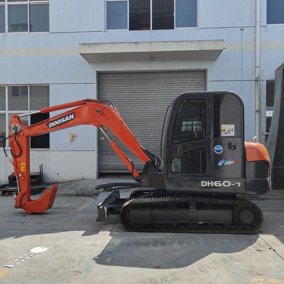 Doosan DH60-7 mini excavator, side view Doosan DH60-7 mini excavator, side view