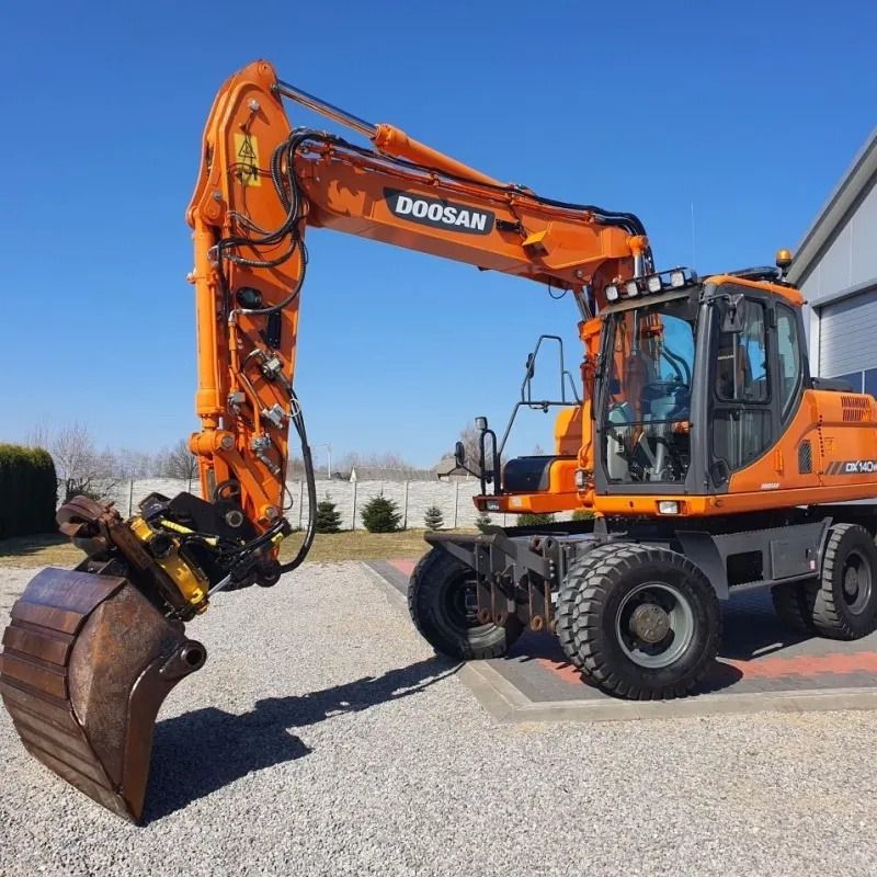 Doosan DX140W wheel excavator, side view