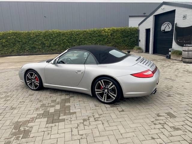 2009 Porsche 997.2 4S rear three-quarter view