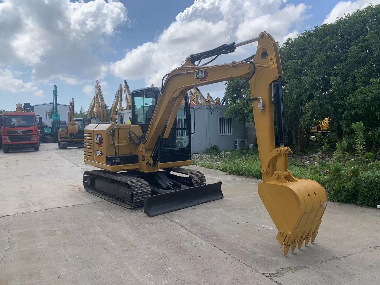 2023 Caterpillar 306E2 crawler excavator, side view