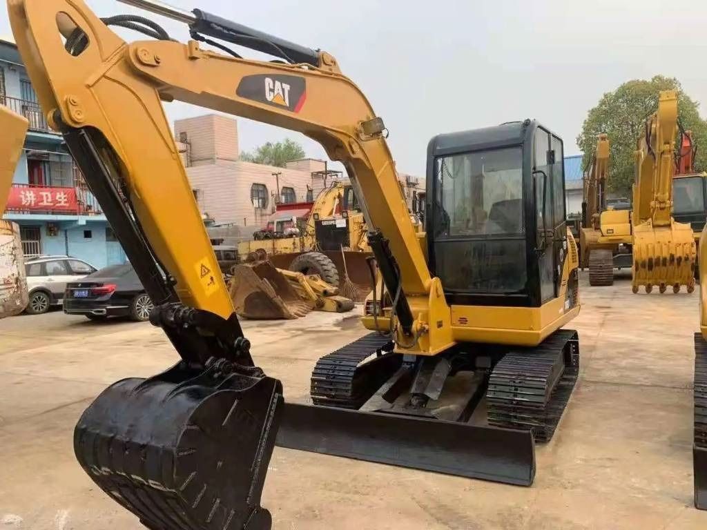 2023 Caterpillar 306D mini excavator, front three-quarter view