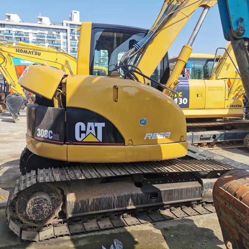 2024 Caterpillar 308C CR excavator, rear three-quarter view
