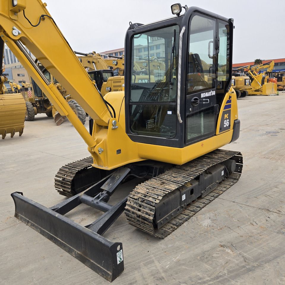 2022 Komatsu PC56-7 mini excavator, front three-quarter view