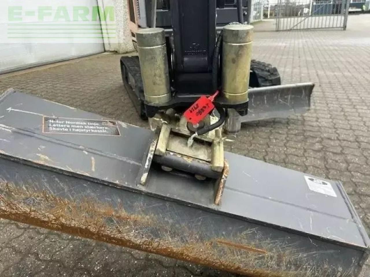 2024 CASE CX 25 EV mini excavator front attachment view