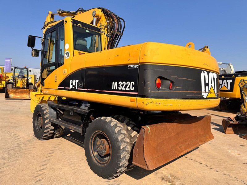 2006 Caterpillar M322C wheel excavator, rear three-quarter view