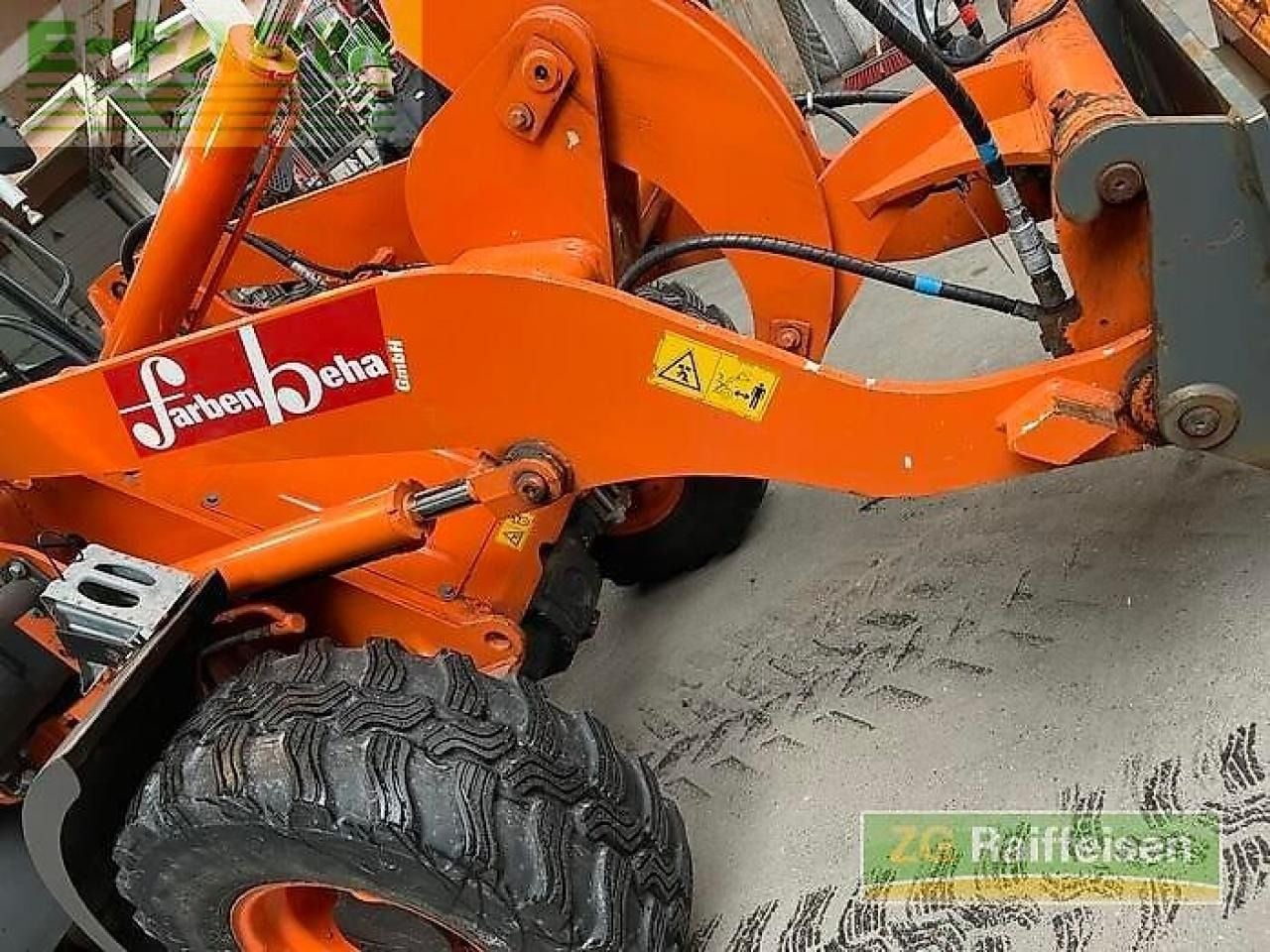 2012 Hitachi ZW75 loader arm and wheel detail