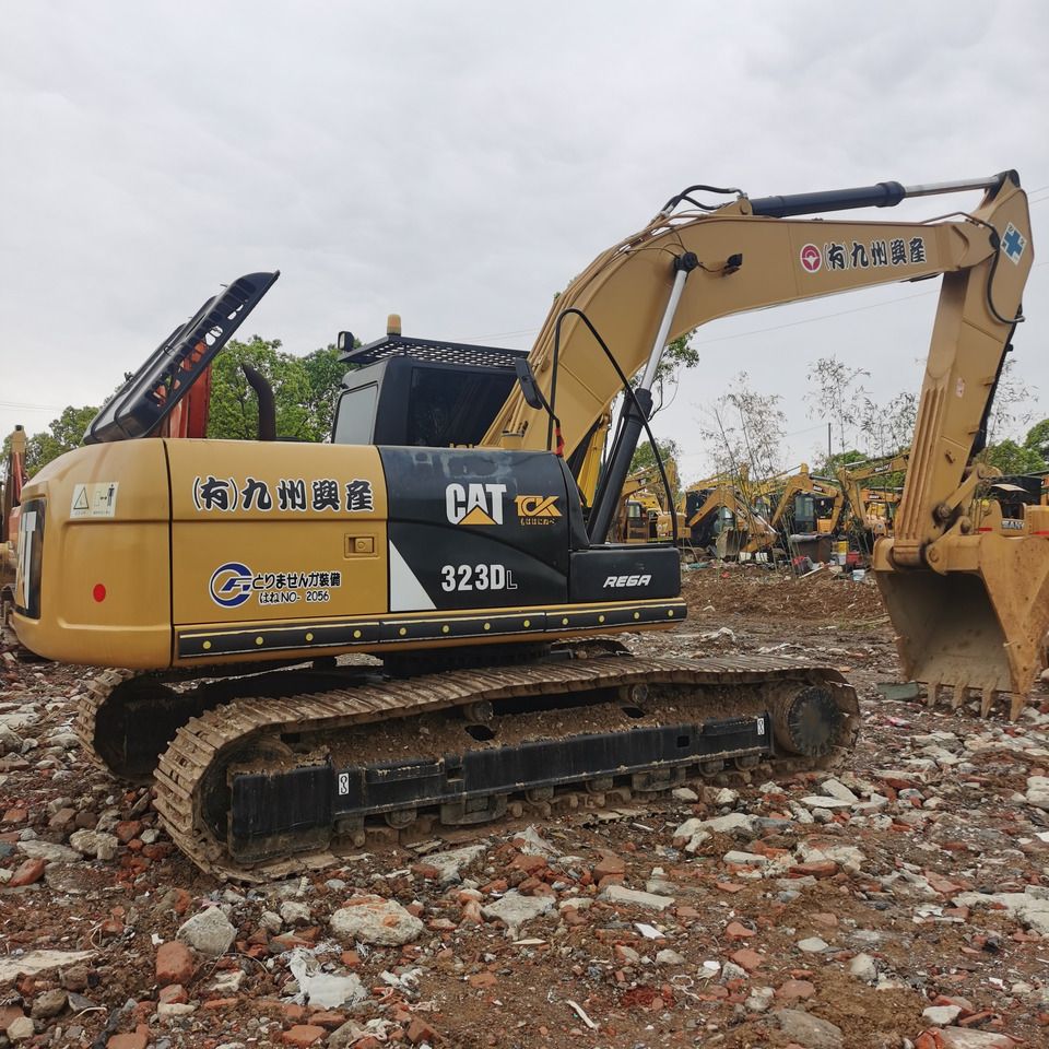 2020 Caterpillar 323DL crawler excavator, rear three-quarter view