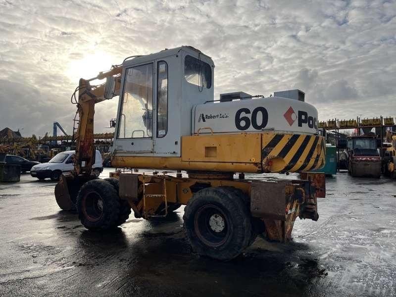 1982 Poclain P60 wheel excavator, rear three-quarter view