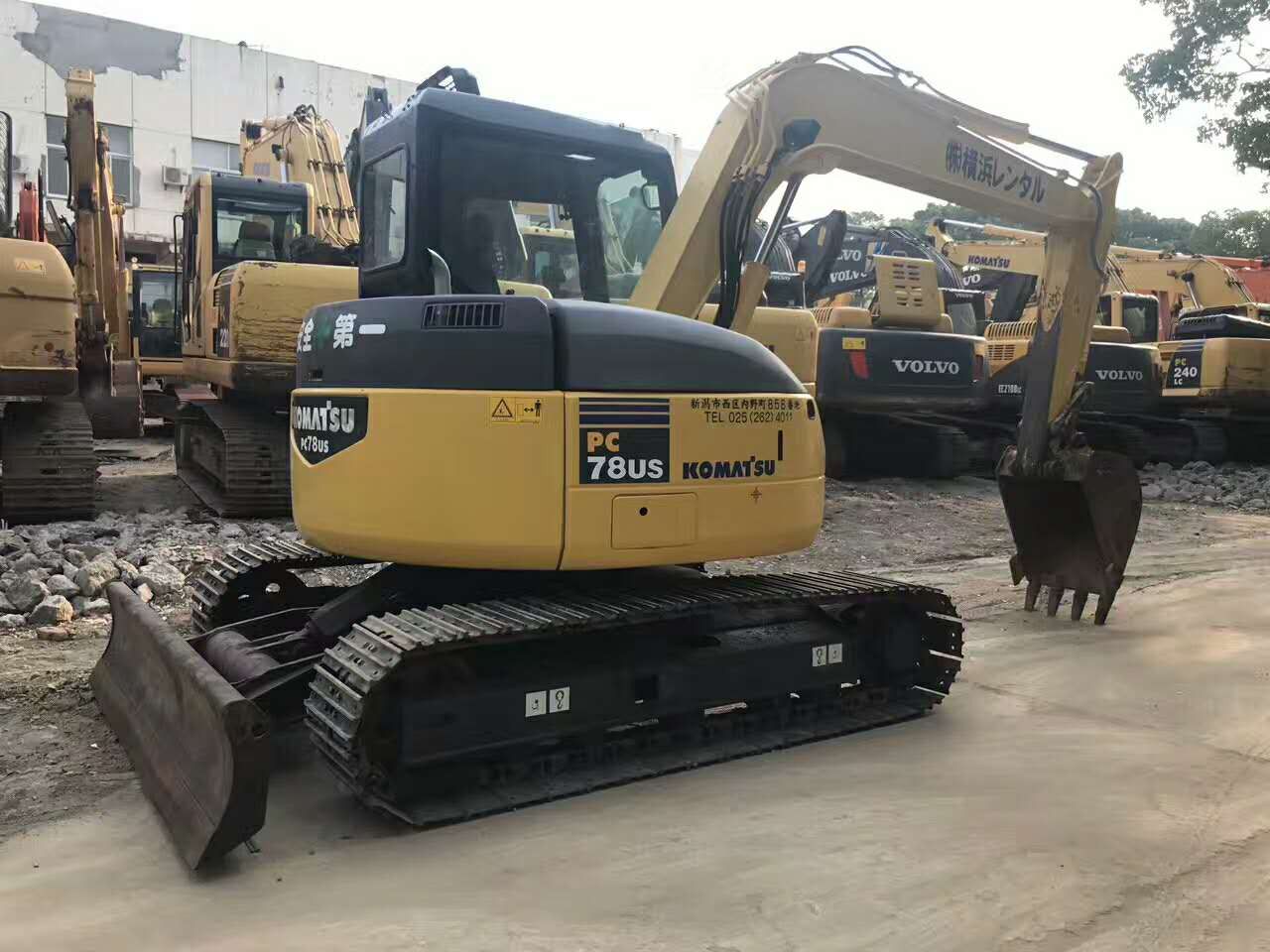 2021 Komatsu PC78US crawler excavator, rear three-quarter view 2021 Komatsu PC78US crawler excavator, rear three-quarter view