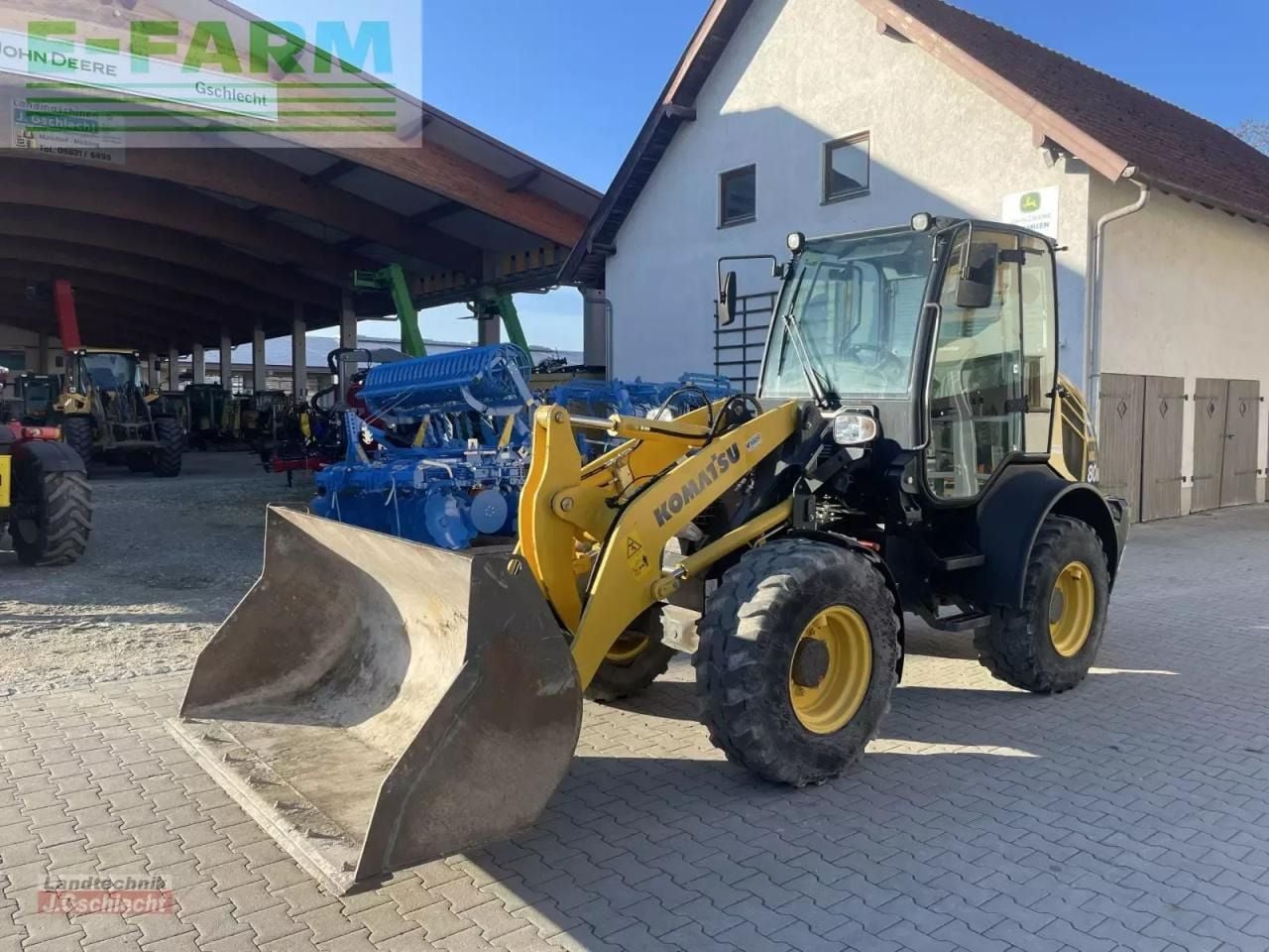 2016 Komatsu WA80M-7 wheel loader, front three-quarter view 2016 Komatsu WA80M-7 wheel loader, front three-quarter view