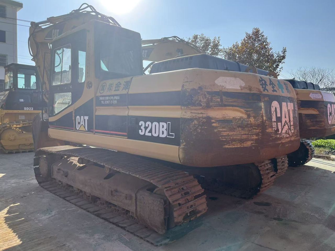2019 Caterpillar 320BL crawler excavator, rear three-quarter view