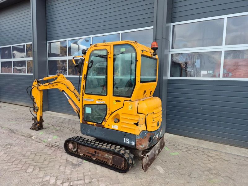 2017 Hyundai R16-9 mini excavator, rear three-quarter view