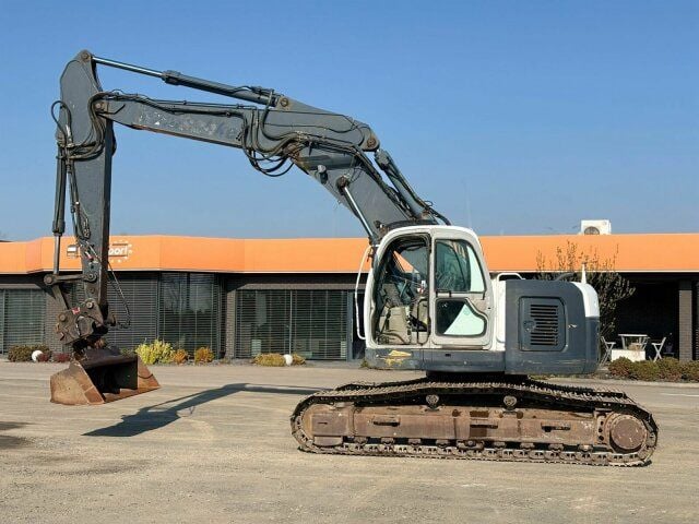 2007 New Holland E235SR-1ES crawler excavator, side profile view