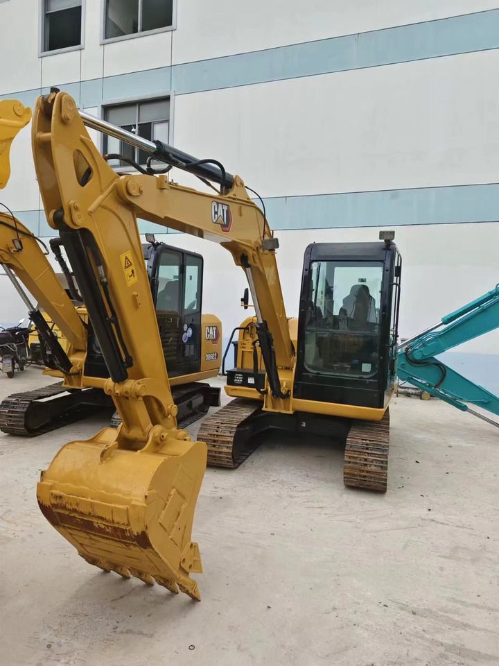 2022 Caterpillar 305.5E2 crawler excavator, front three-quarter view