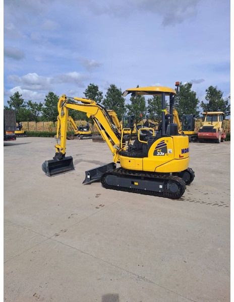 2024 Komatsu PC33E-6 mini excavator, rear three-quarter view