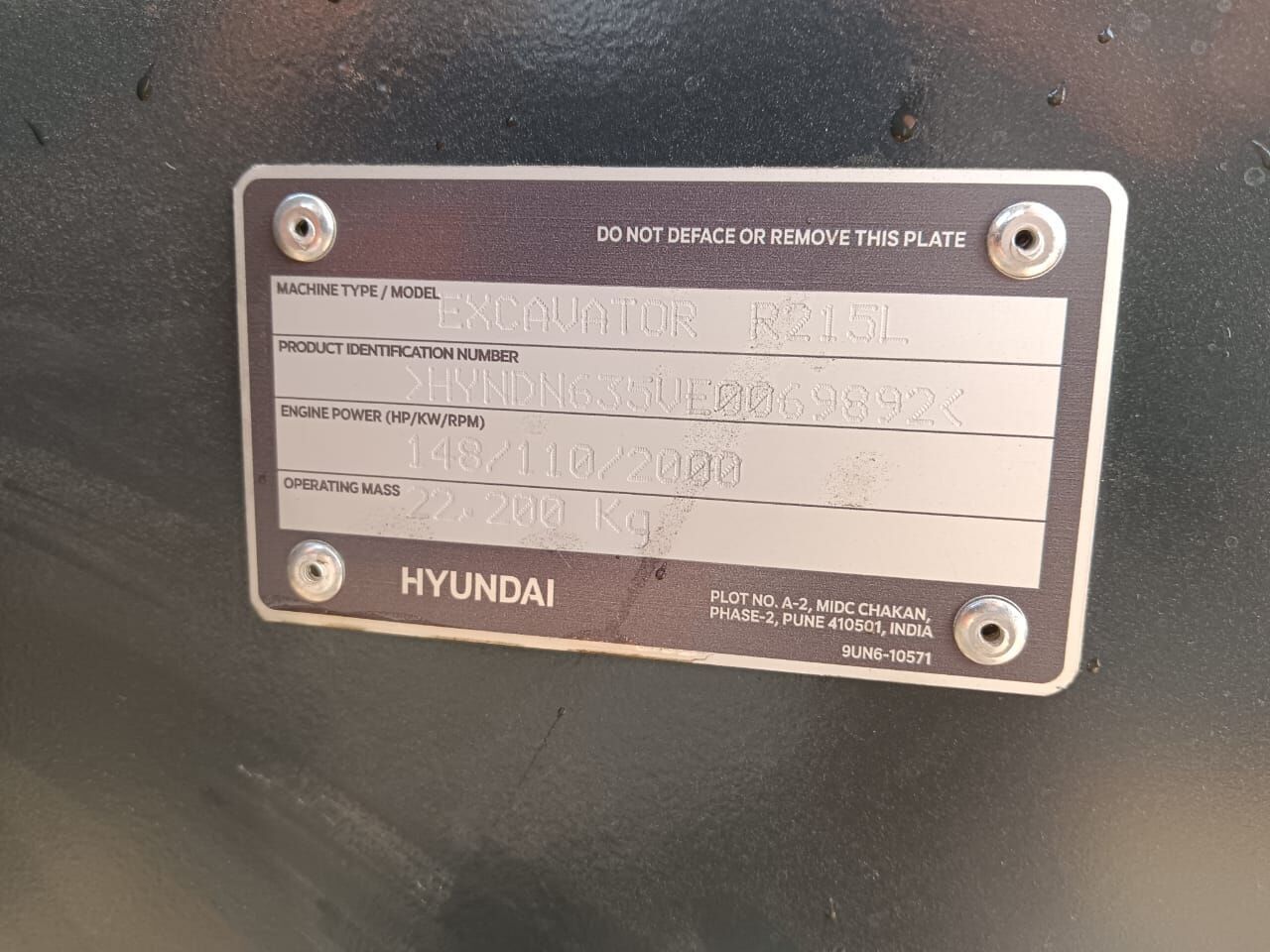 2025 Hyundai R215L Crawler Excavator with a detailed view of the product identification plate. 2025 Hyundai R215L Crawler Excavator with a detailed view of the product identification plate.