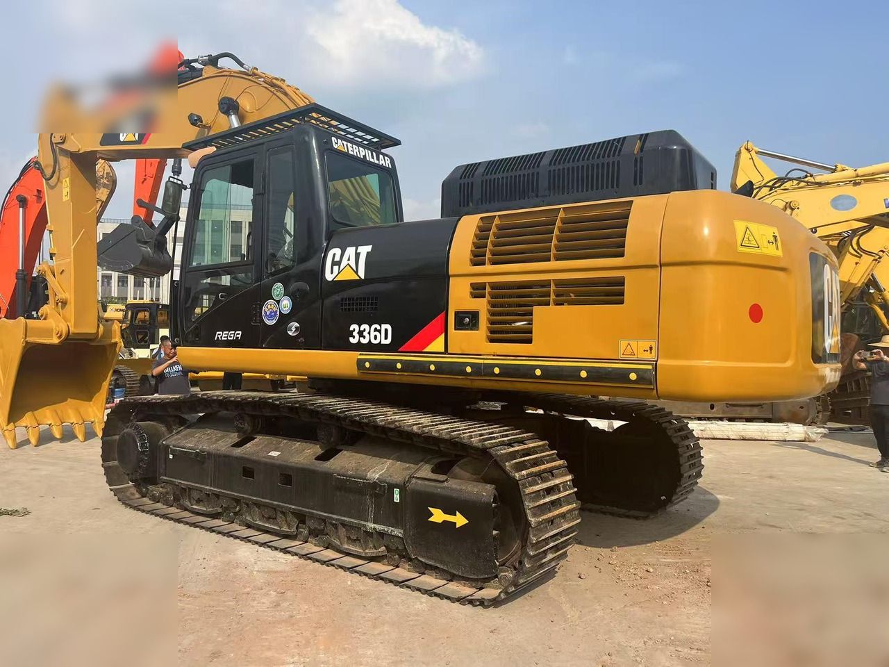 2022 Caterpillar 336D crawler excavator, rear three-quarter view