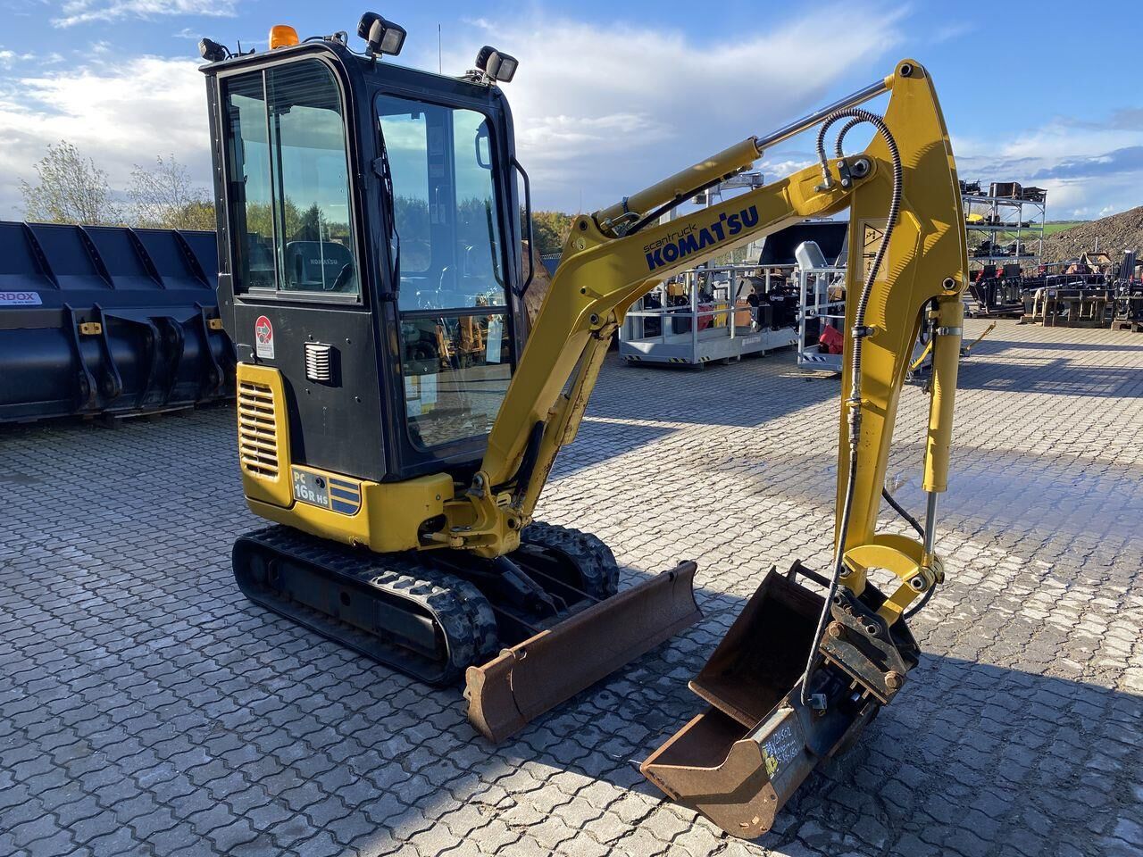 2018 Komatsu PC16R-3HS mini excavator, front three-quarter view