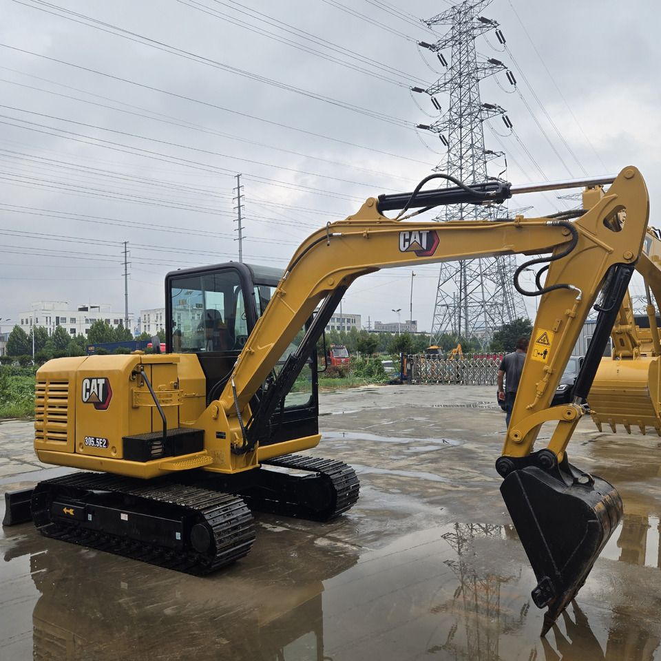 2022 Caterpillar 305.5E2 mini excavator, side view