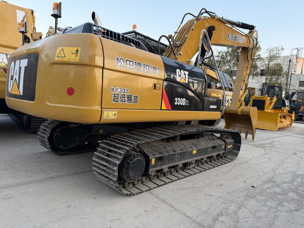 2025 Caterpillar 330D2L crawler excavator, rear three-quarter view