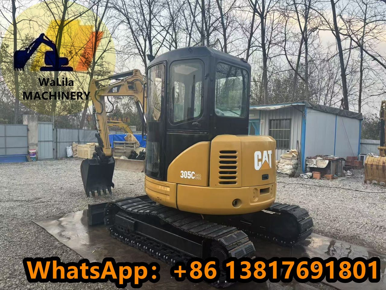2023 Caterpillar 305CCR mini excavator, rear three-quarter view