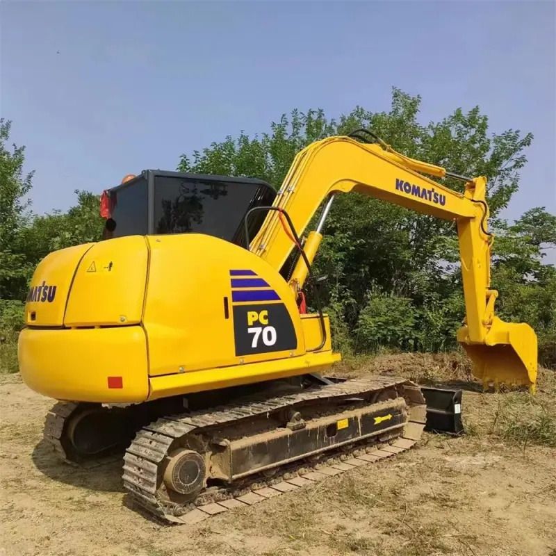 Komatsu PC70 crawler excavator, rear three-quarter view Komatsu PC70 crawler excavator, rear three-quarter view
