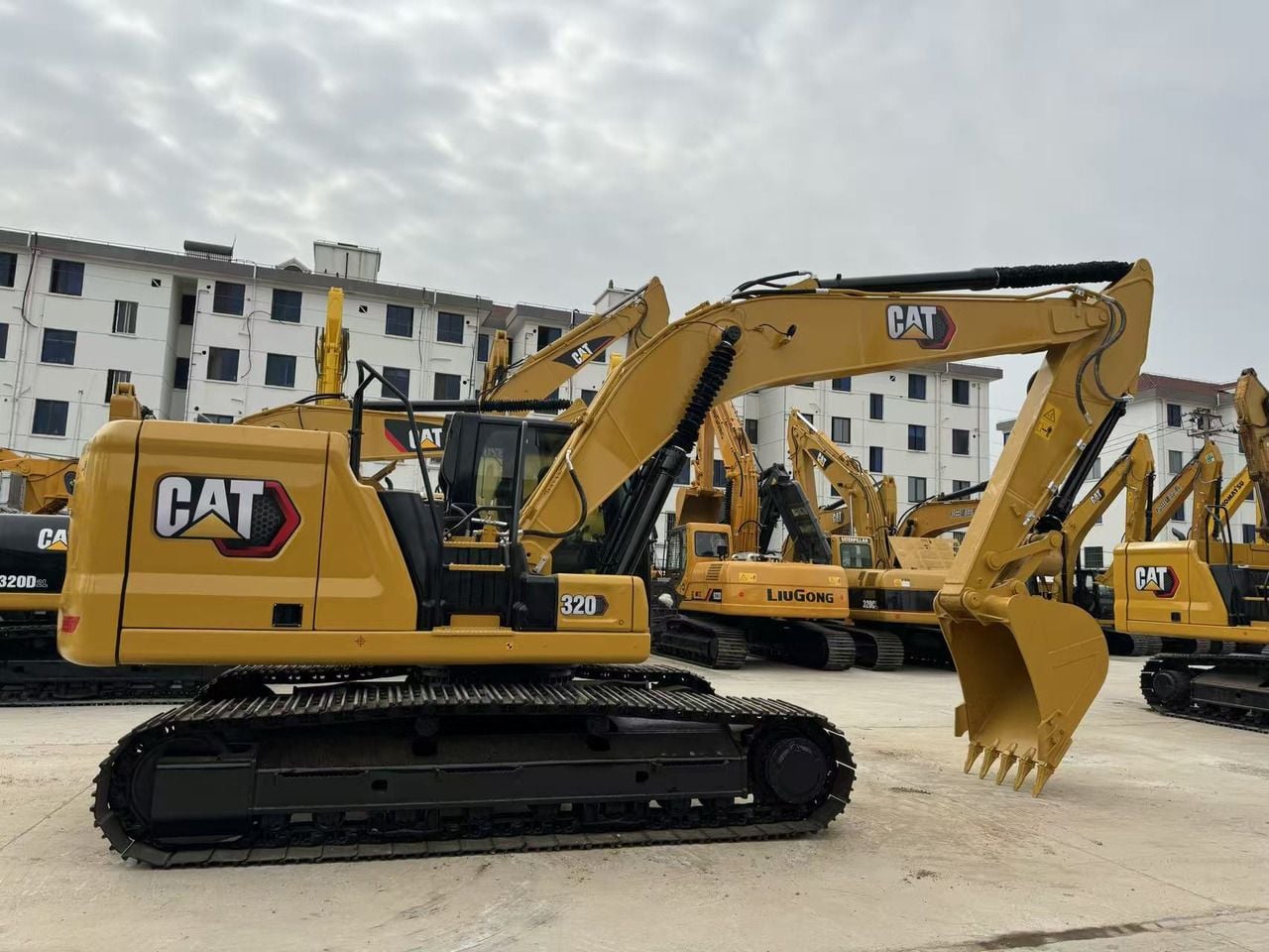 2024 Caterpillar 320 crawler excavator, side view