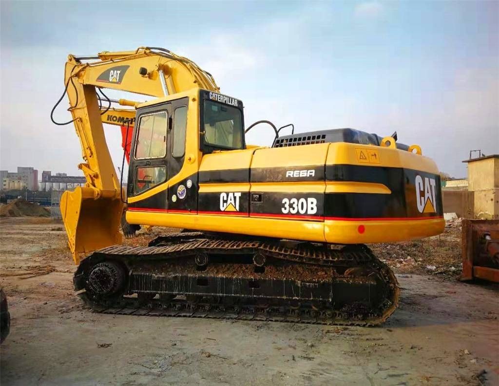 2023 Caterpillar 330B crawler excavator, rear three-quarter view