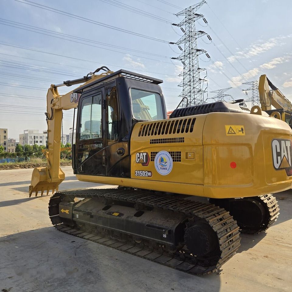 2021 Caterpillar 315D2 crawler excavator, rear three-quarter view
