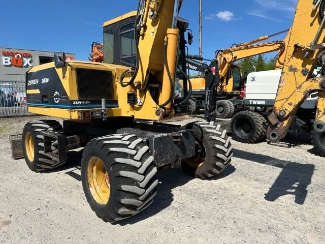 1999 Zeppelin ZM 100 wheel excavator, rear three-quarter view