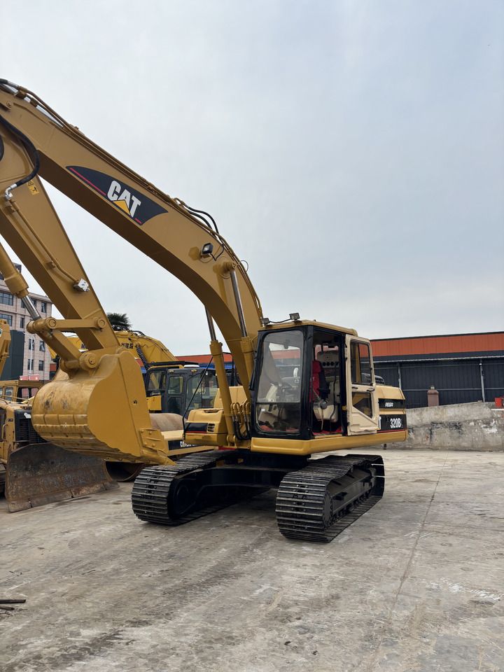 2023 Caterpillar 320BL crawler excavator, side view