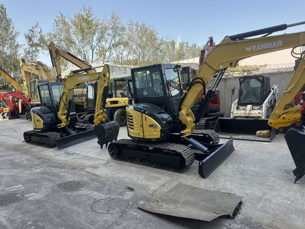 2024 Yanmar VIO55-6 mini excavator, front three-quarter view