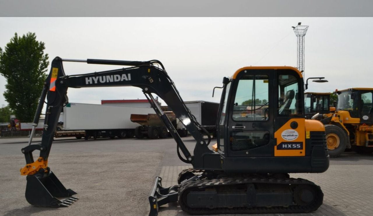 2021 Hyundai HX55 mini excavator, side view