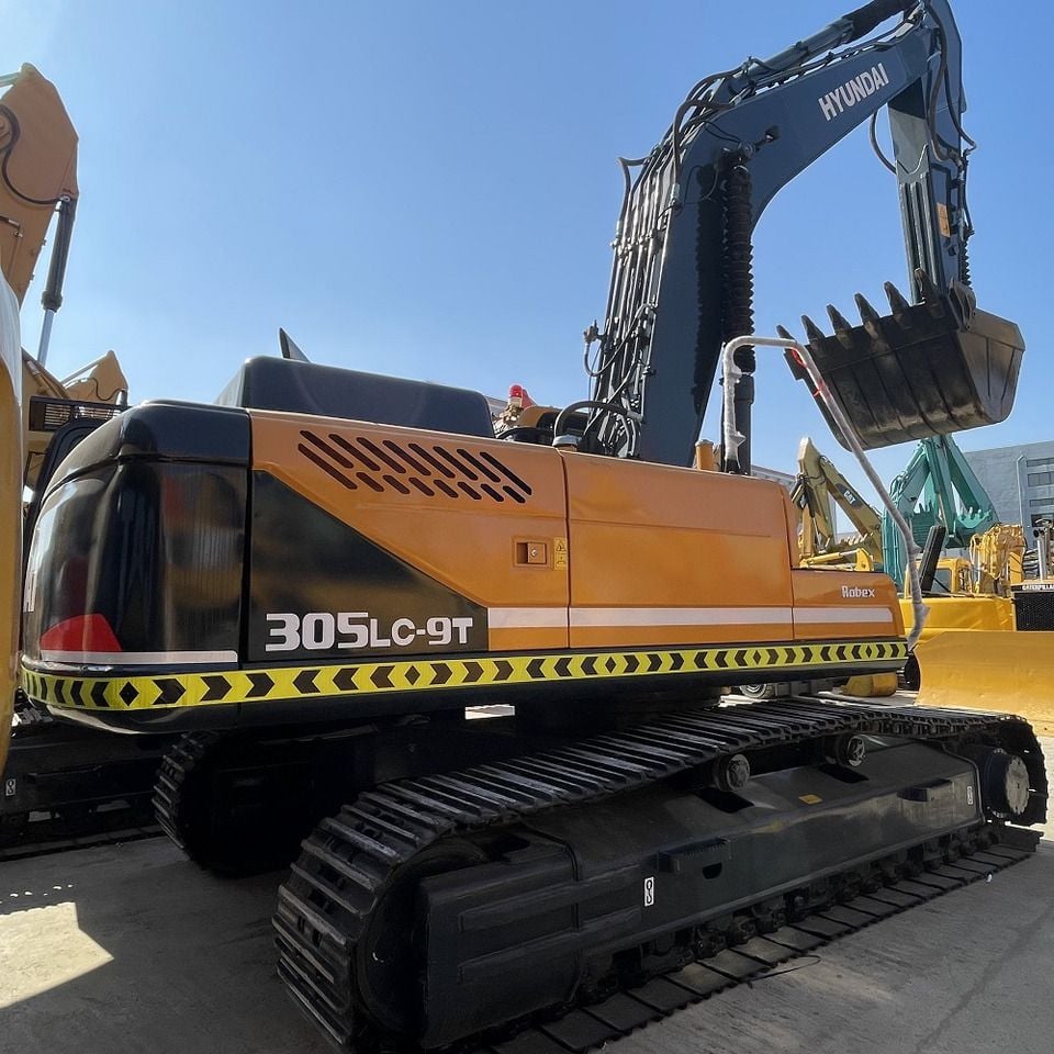 2023 Hyundai 305LC-9T crawler excavator, rear three-quarter view